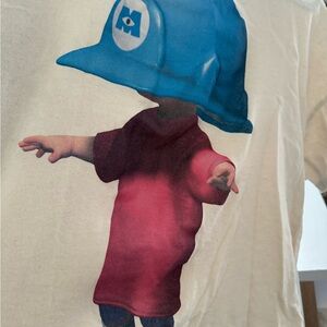 Graphic Tee with Blue Hat Design